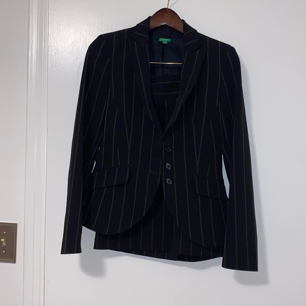 Black pinstripe suit, with pencil skirt
